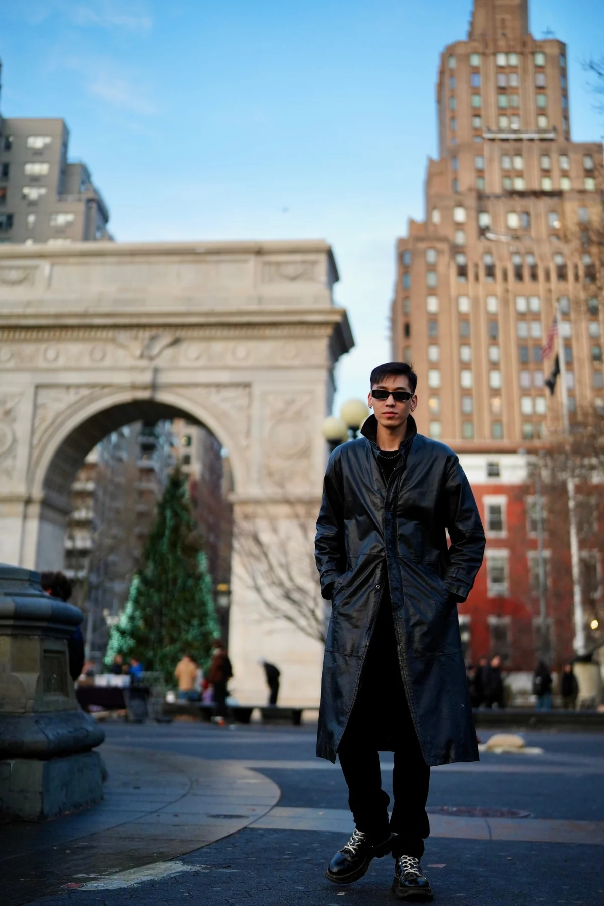 Ricky Li, founder of Elemental Astro, standing in Washington Square Park in New York City.